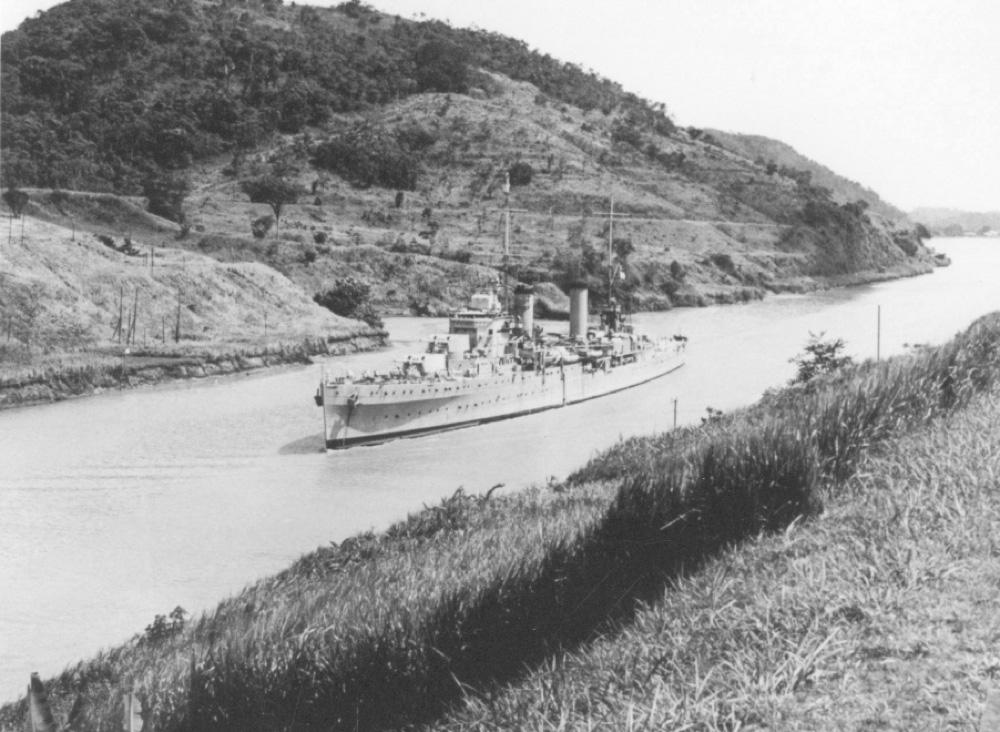 A Royal Australian Navy ship named HMAS Perth sailing through the Panama Canal.